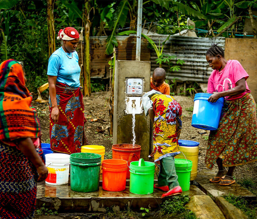 eWater Tap hardware being used by villagers in the Gambia